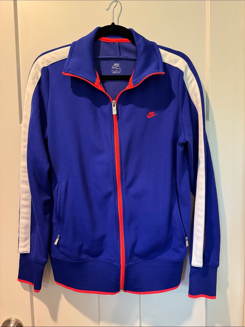 Nike Royal Blue Track Jacket with White Stripes and Red Accents